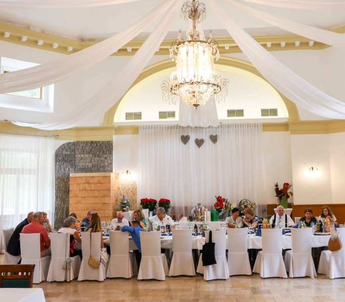 Wedding celebration behind a long table